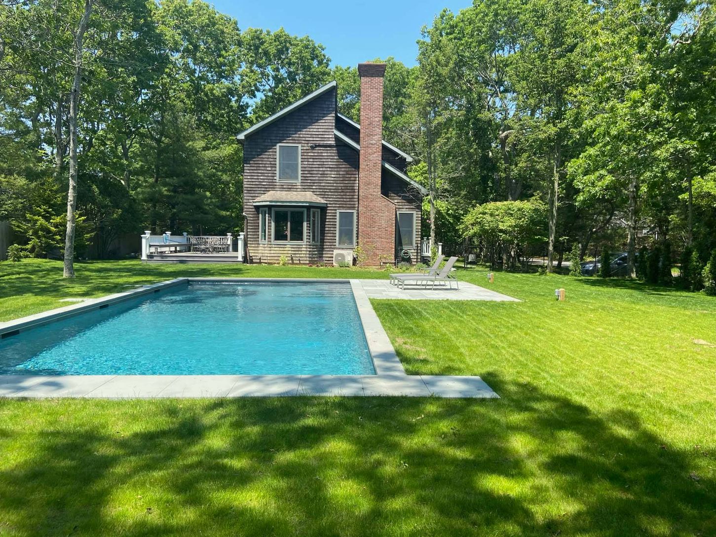 Lawn and heated gunite pool