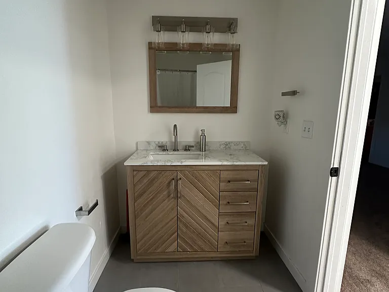 Upstairs bathroom with bathtub