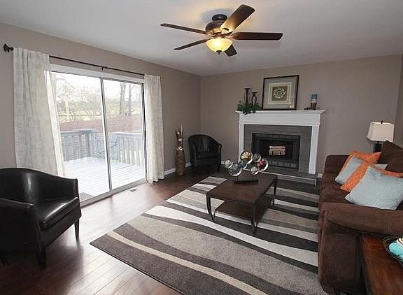 Family room offers new hardwood and fireplace!