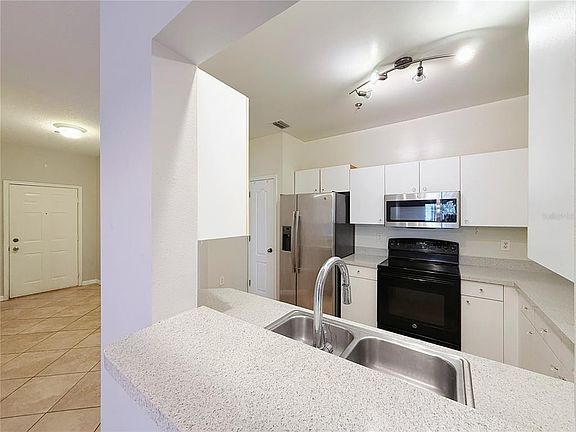 3rd image of 4865 CYPRESS WOODS DRIVE #2106