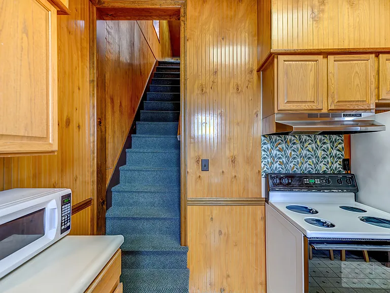 Entry to second floor off kitchen