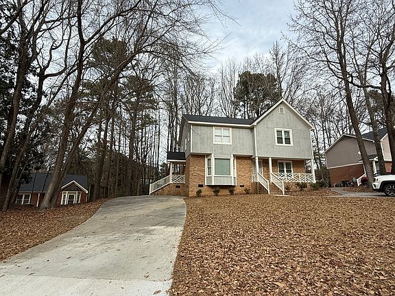 Front view of 2 unit duplex, private drive (left unit)