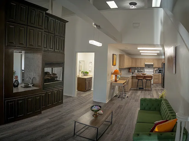 Entertain effortlessly. The open floor plan connects the fully equipped kitchen island directly to the living room _ ideal for groups, families, or a couple who wants to cook together without missing a conversation.