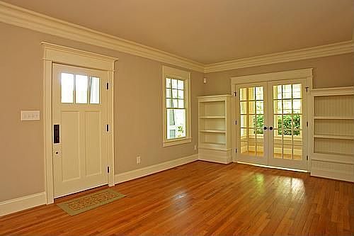 View of Living room to sunroom.