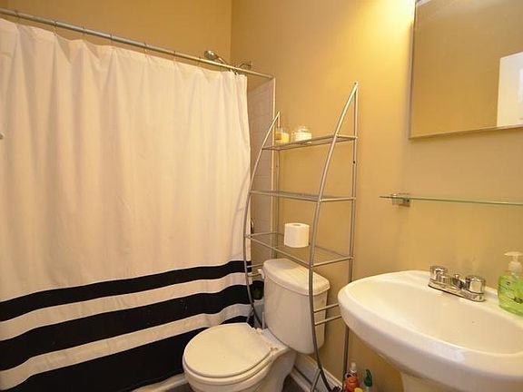 1st floor bath next to large bedroom