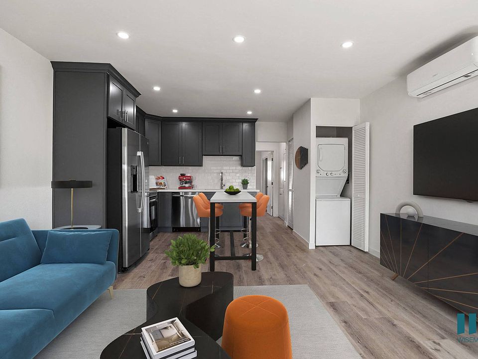 Kitchen, Dining, and Living Room with In-Suite Washer & Dryer