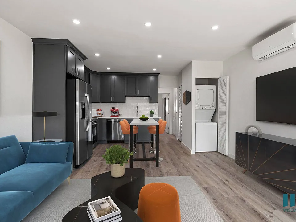 Kitchen, Dining, and Living Room with In-Suite Washer & Dryer