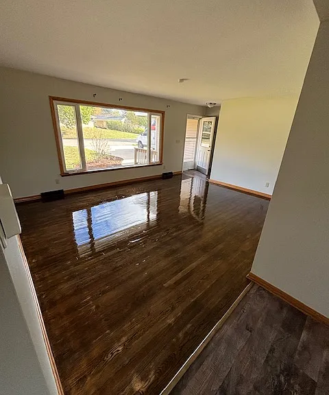 Front Living Room with freshly varnished hardwood floors