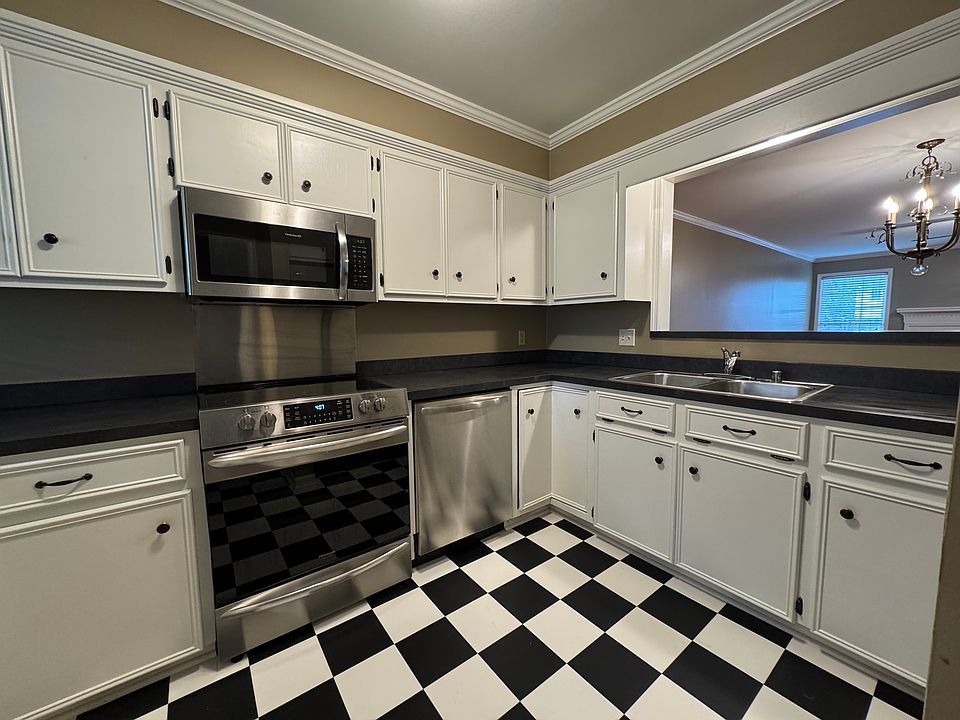 Kitchen with pass-through to Dining.