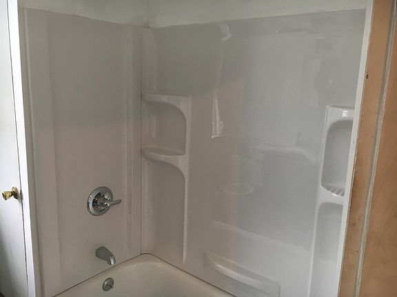 Brand new tub and shower surround