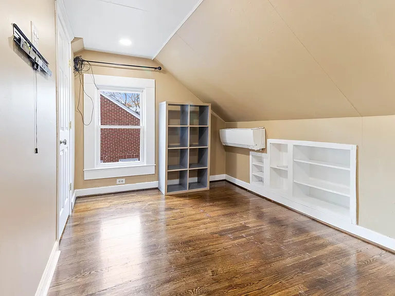 Upstairs Sitting Area Cozy upper landing with seating area ideal for reading, remote work, or a morning coffee nook.
