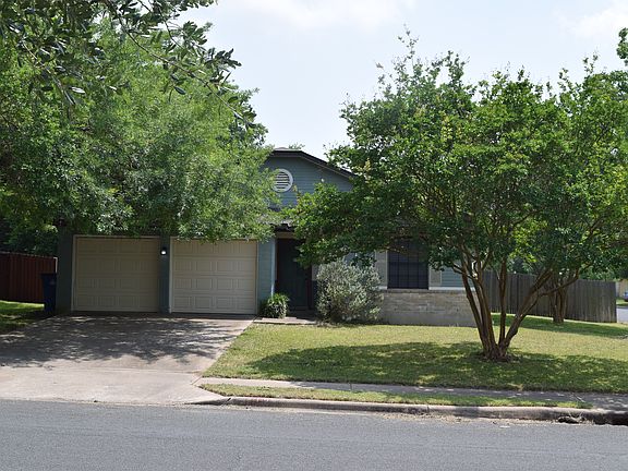 Front View; 2 Car Garage 