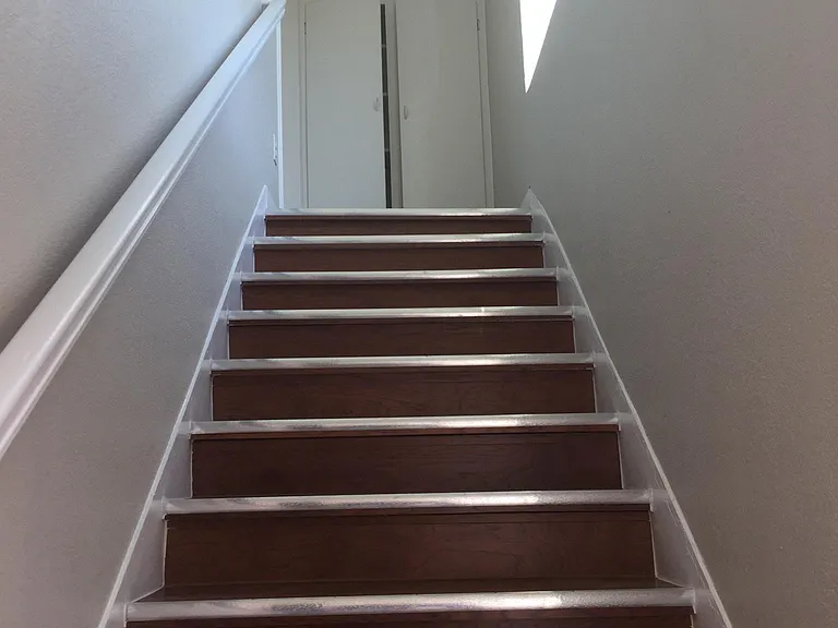 from exterior entrance looking up to entryway storage