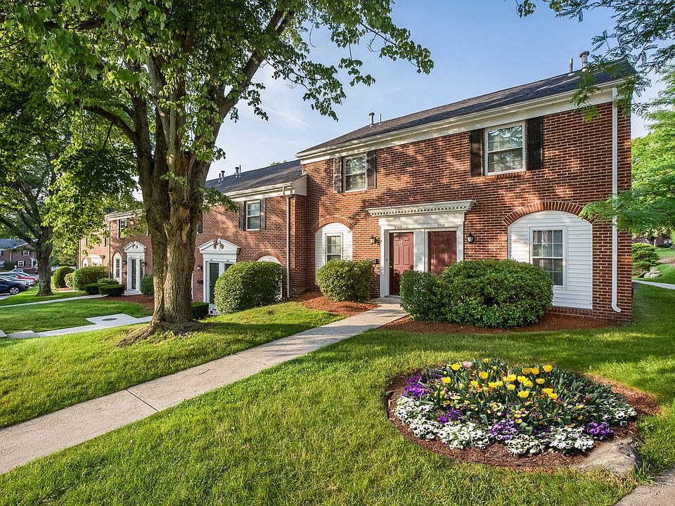 Two floor townhome living with private entry ways and plenty of New England charm