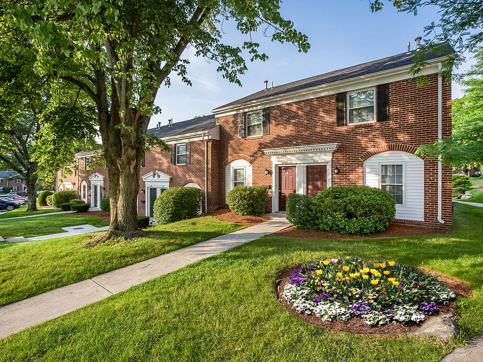 Two floor townhome living with private entry ways and plenty of New England charm