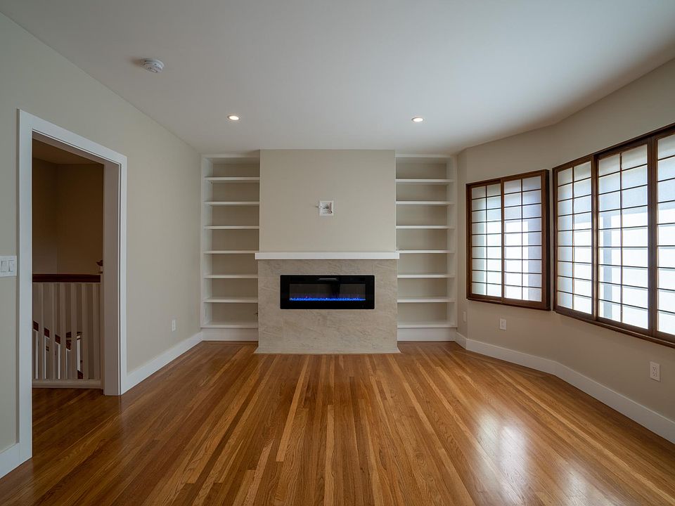 Large bright living room with fireplace
