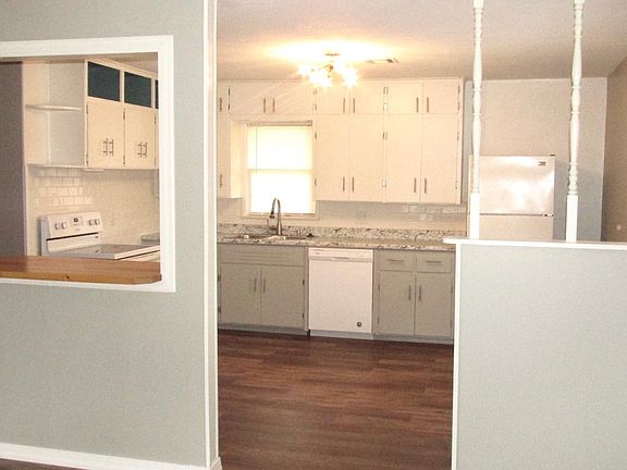 The wood counter on the passthrough is now a darker color.