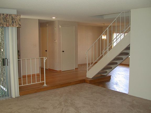 IN LIVING ROOM LOOKING BACK ON THE FOYER