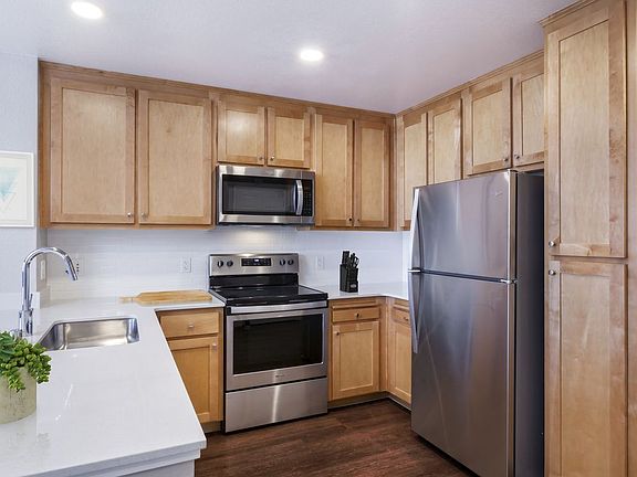 Renovated Package II Kitchen with stainless steel appliances and hard surface flooring