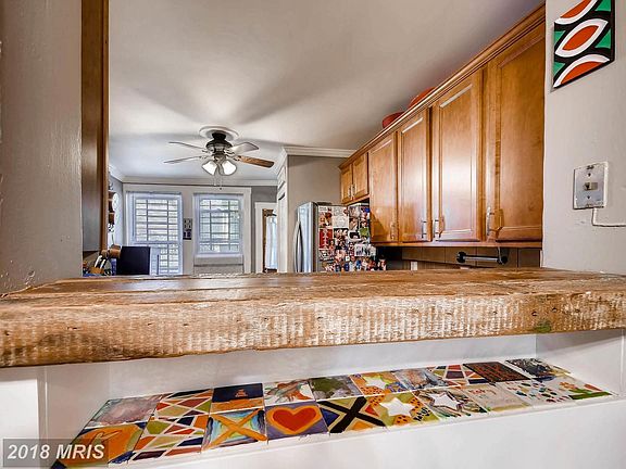 Reclaimed Wooden Top in Kitchen Pass Through