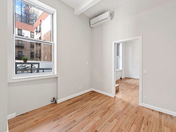 5th image of 51 E 10th St APT 6