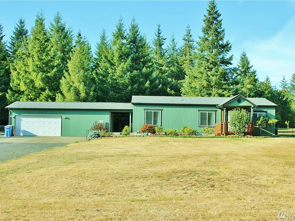 Set off from the road, private neighborhood of nicely kept homes, easy landscaping and a very well kept gem on 2.5 acres.  Fresh gravel driveway, plenty of off street parking and a large double garage w/additional storage rms