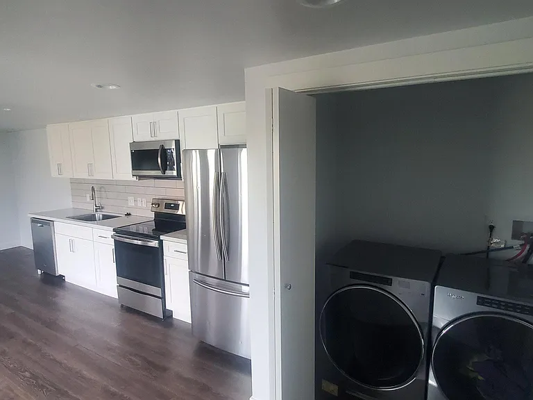 Full-size washer and dryer too, with more room for storage