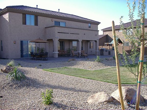 Expansive Backyard with large paver patio and built in BBQ