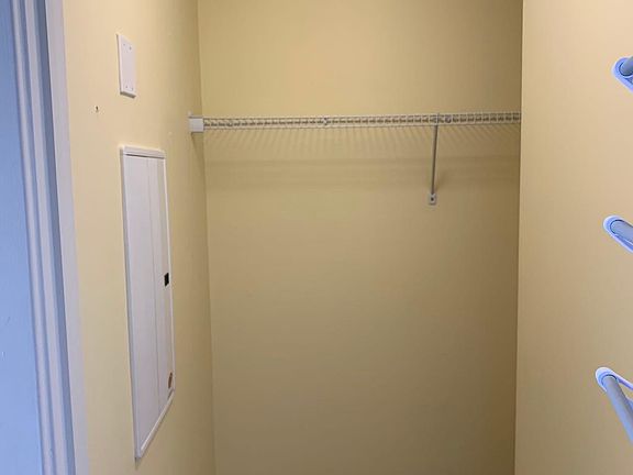 big walk-in closet in the bedroom