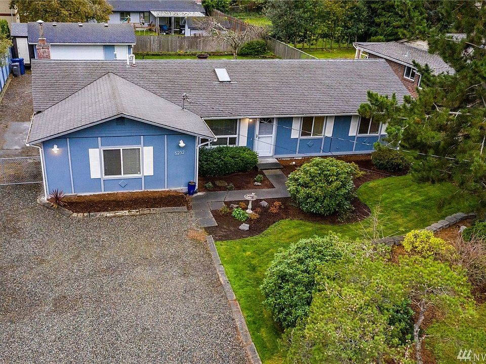 House sits back away from street with driveway to accomodate 6 or more cars.