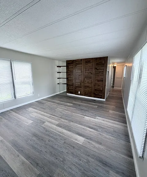 Large living space with built-in shelving