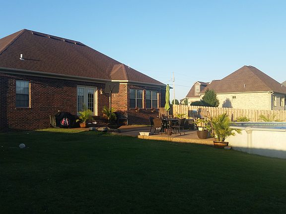 rear view with pool