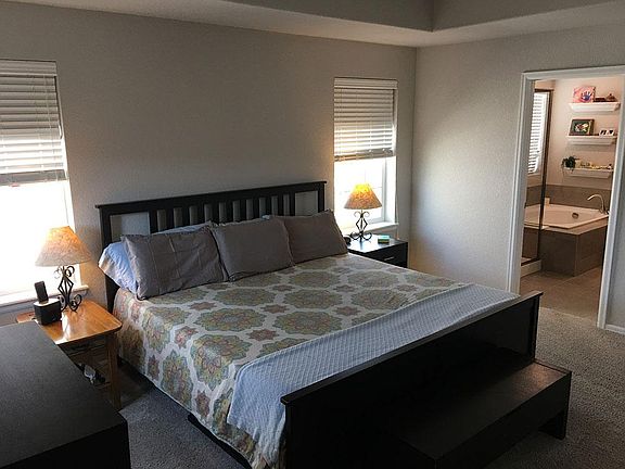 Large master bedroom with plenty of room for a king sized be