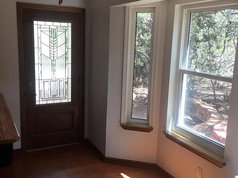 Kitchen bay window and backyard door