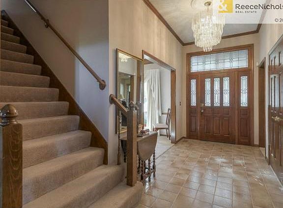 Step inside this well maintained home to the beautiful tile floo