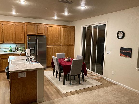 Breakfast nook and access to back patio.