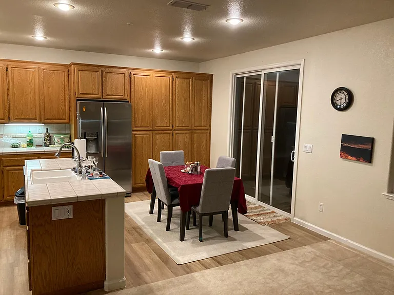 Breakfast nook and access to back patio.