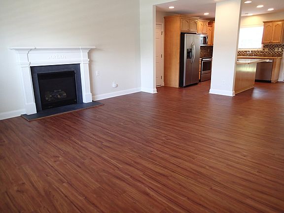 Open floor plan with vaulted ceiling