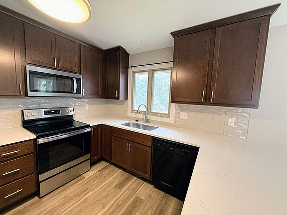 Brand new appliances, tile, and countertops