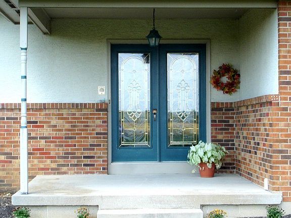 Covered entry/designer doors