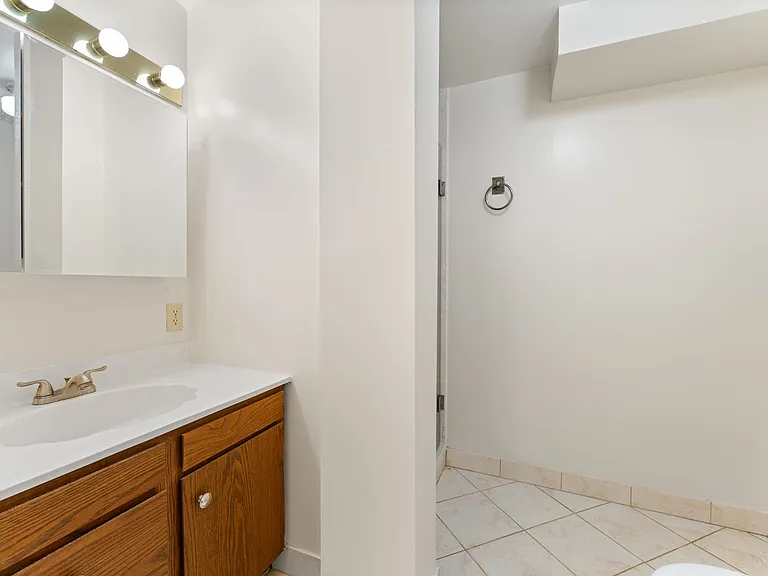 Spacious vanity cabinet in 4th full lower level bathroom