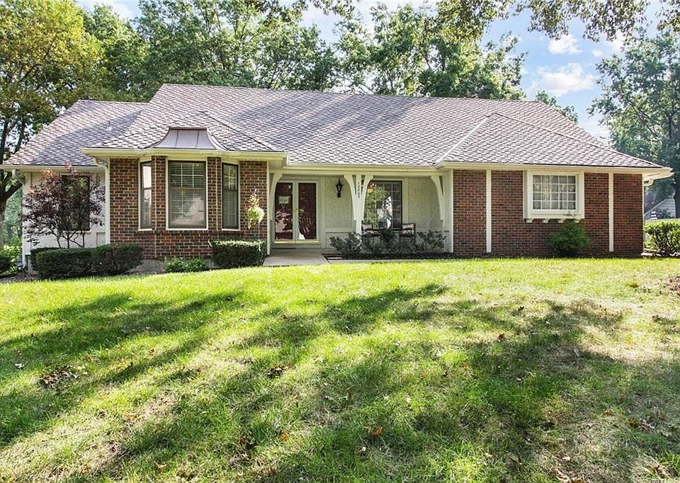 Welcome Home to this beautiful 1.5 story home on a golf course lot in Leawood South.
