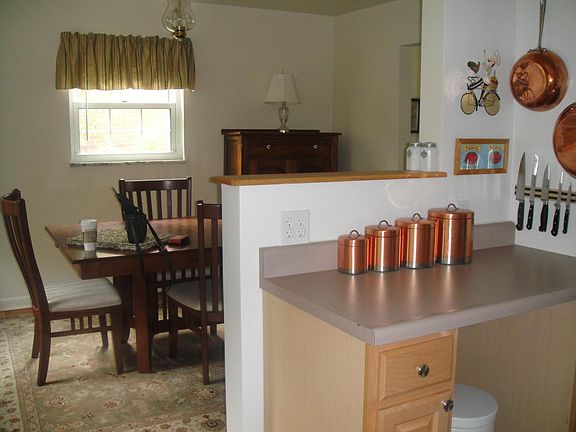 Eat-at counter in kitchen gives a view through to the dining