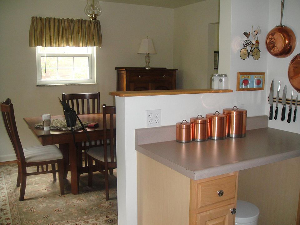 Eat-at counter in kitchen gives a view through to the dining