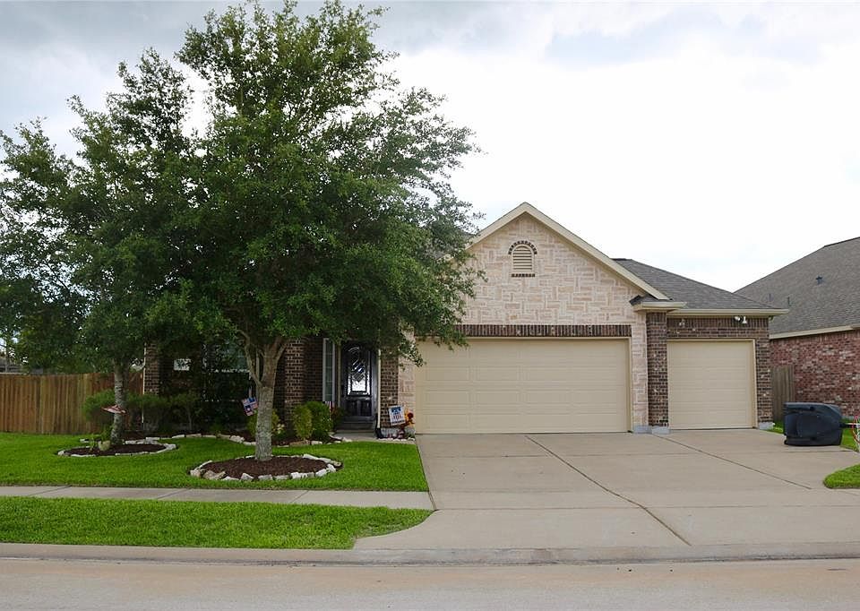 Welcome home to 26603 Fielder Brook Lane. The details are everywhere inside and out! You will be hard pressed to find a more decked out home! The brick and stone elevation add to the curb appeal. This is what you've been looking for and this is what 