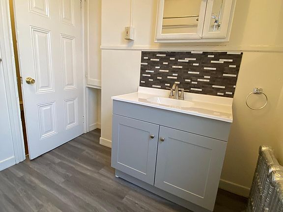 New vanity in bathroom and linen closet