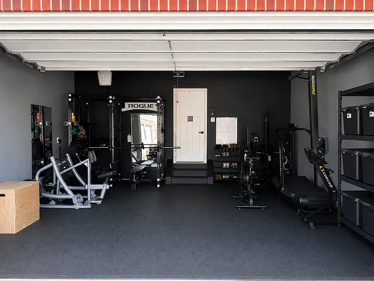 Finished Two-Car Garage (Staged as a Home Gym)