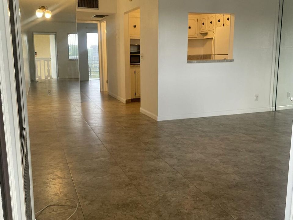 1st image of 500 Village Green Cir W APT 302