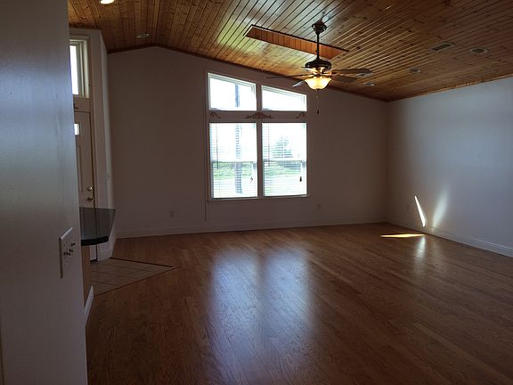 Living area: skylites, patio door,
