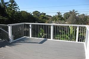 backyard deck with peak ocean view